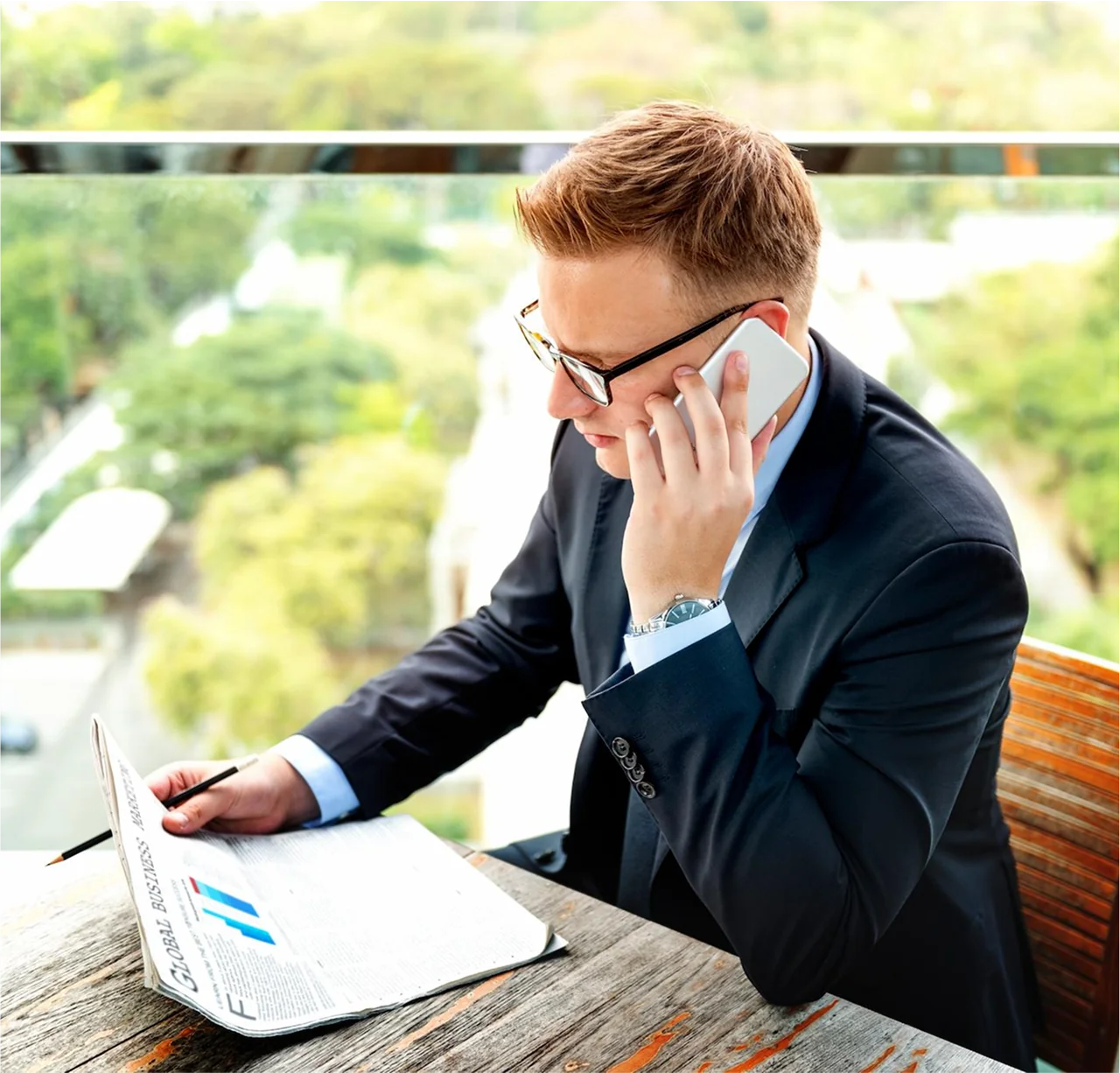 businessman reading Cash Flow Forecast