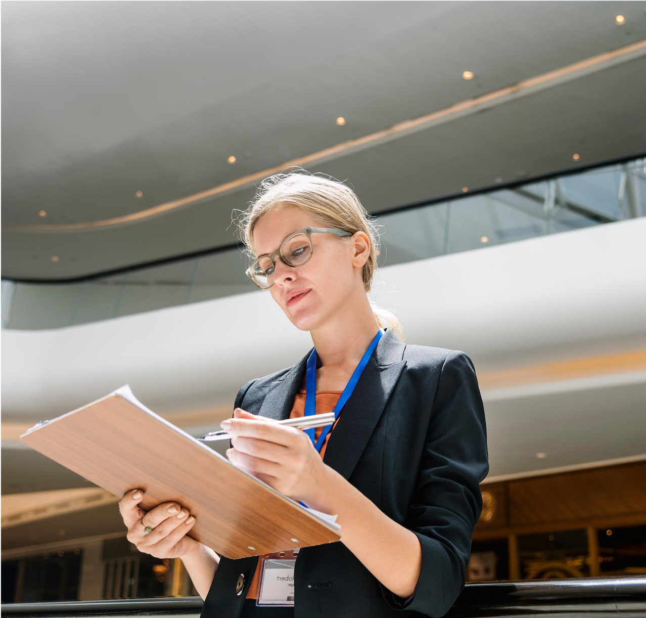 businesswoman looking at her Pro Forma Income Statement businesswoman looking at her Pro Forma Income Statement