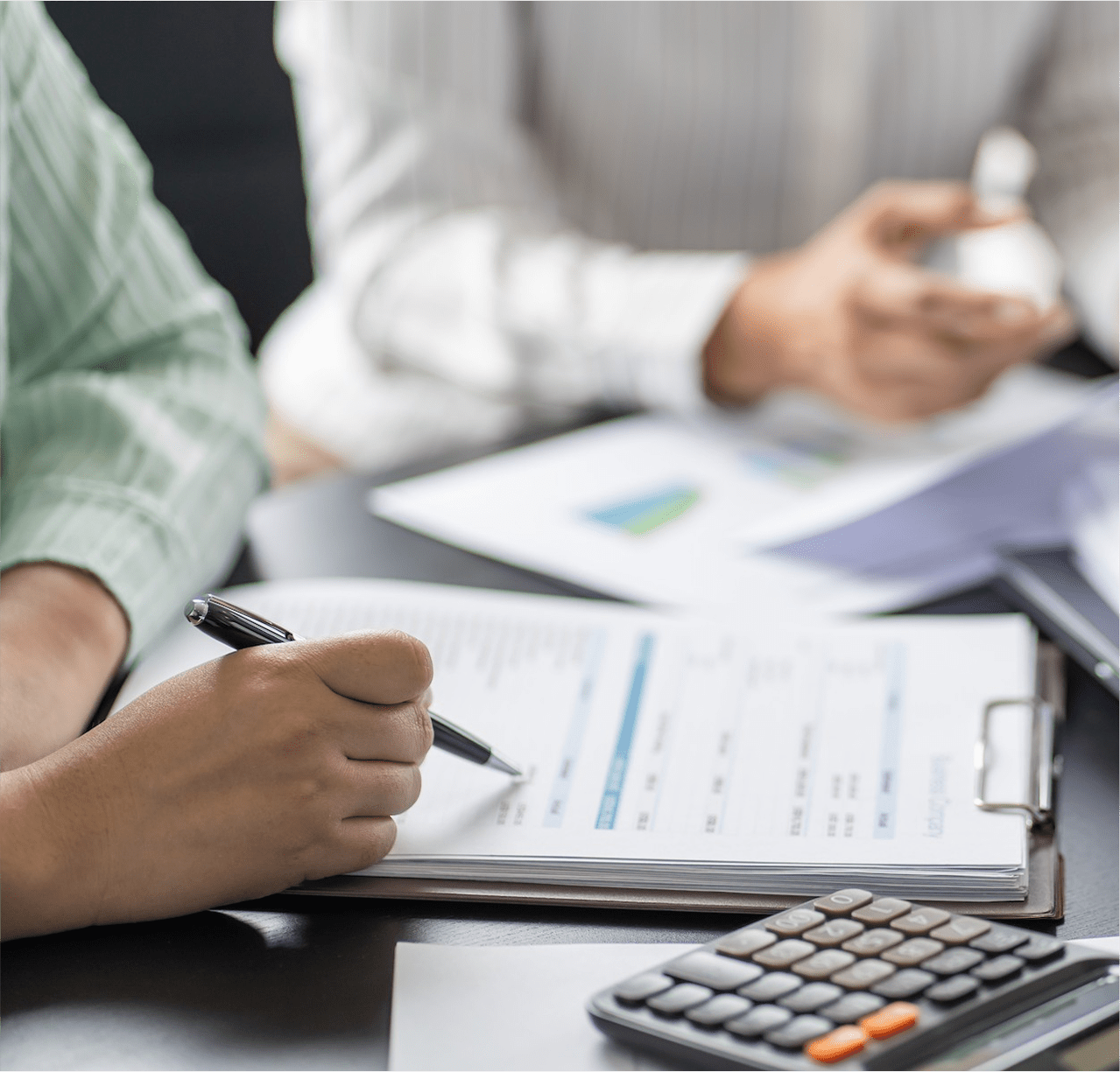 Accountants working on Year-End close Accountants working on Year-End close